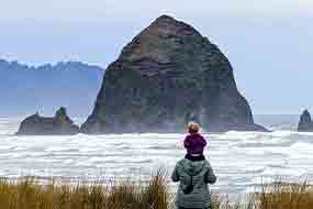 Stroll along the beach at Haystack Rock.